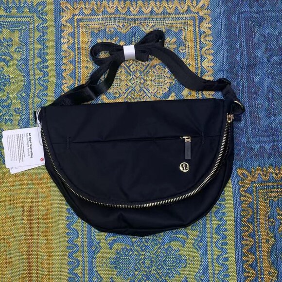 lululemon athletica Handbags - Lululemon All Night Festival Bag 5L Black with gold